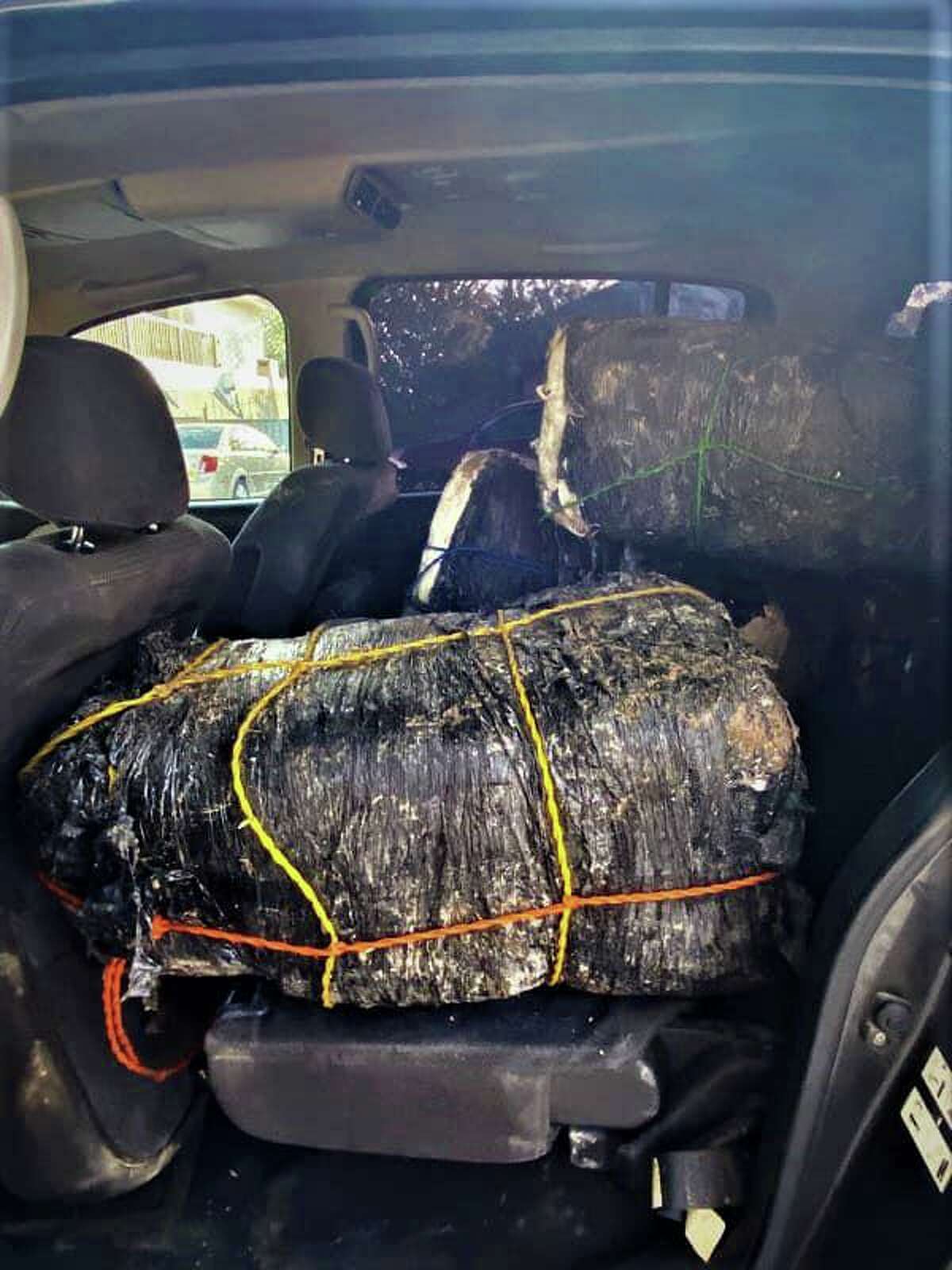U.S. Border Patrol said this vehicle loaded with approximately $381,000 in marijuana was abandoned in the parking lot of Father McNaboe Park. The contraband weighed 477.3 pounds.