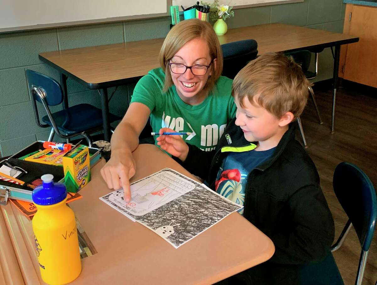 First-grade teacher Katie Parker works with a student. (Traci Weisenbach/Courtesy Photo)