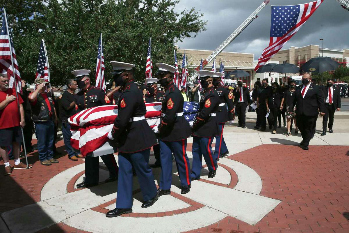 The body of U.S. Marine Lance Cpl. David Lee Espinoza arrives at St. Patrick Catholic Church for a funeral mass in Laredo, Texas, Monday, Sept. 13, 2021. Espinoza was one of soldiers that died during a suicide bomb attack while guarding the Kabul, Afghanistan airport on Aug. 26.