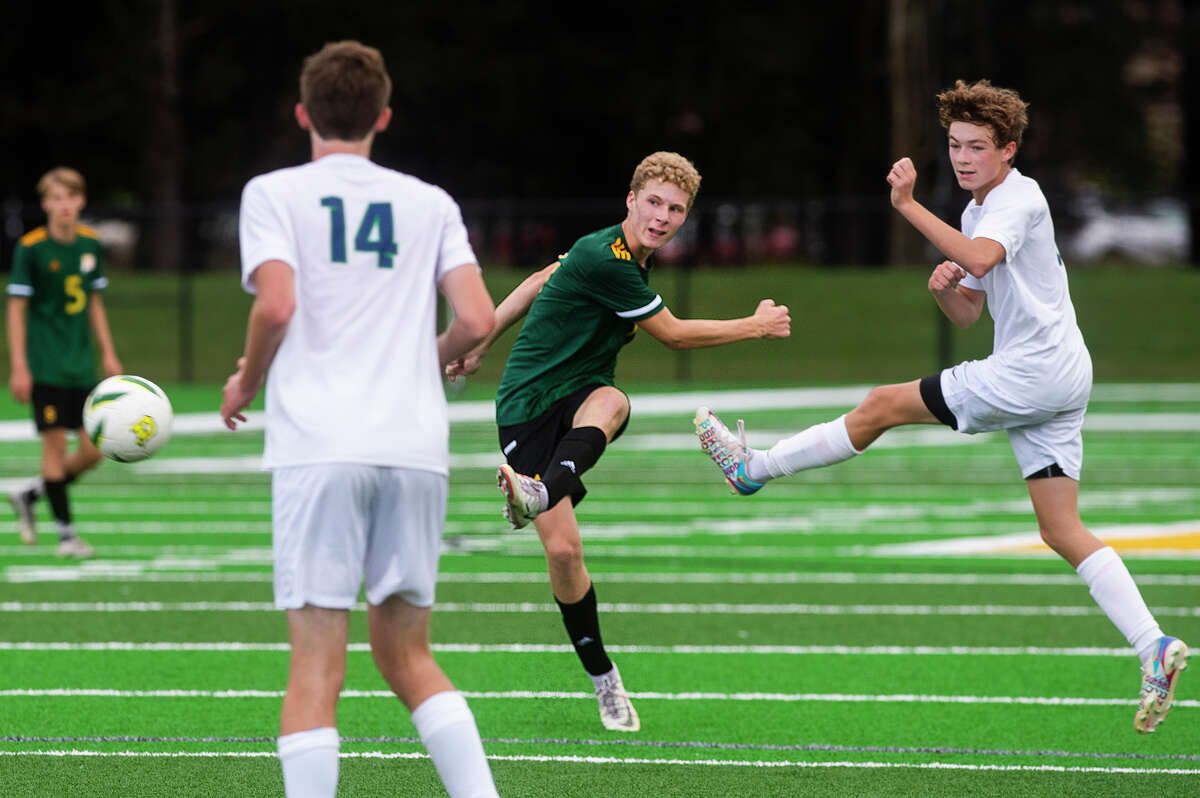 Dow's Jack Wolohan takes a shot on goal during the Chargers' game against Lapeer Monday, Sept. 13, 2021 at H. H. Dow High School. (Katy Kildee/kkildee@mdn.net)
