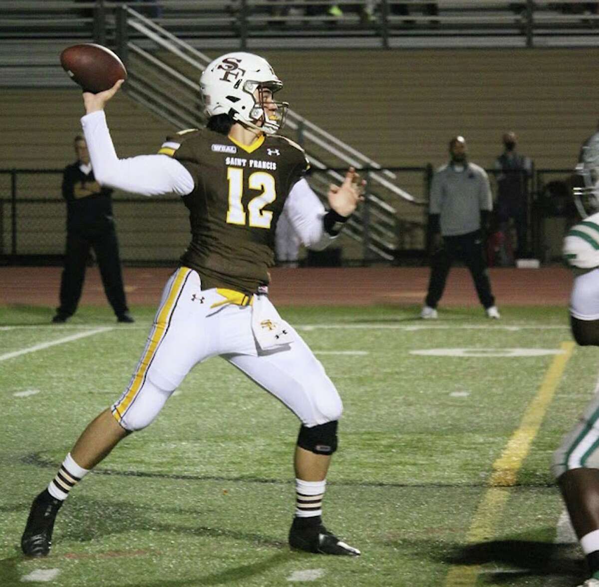St. Francis quarterback Matthew Dougherty threw three touchdowns passes in his team's 31-28 defeat of De La Salle-Concord.