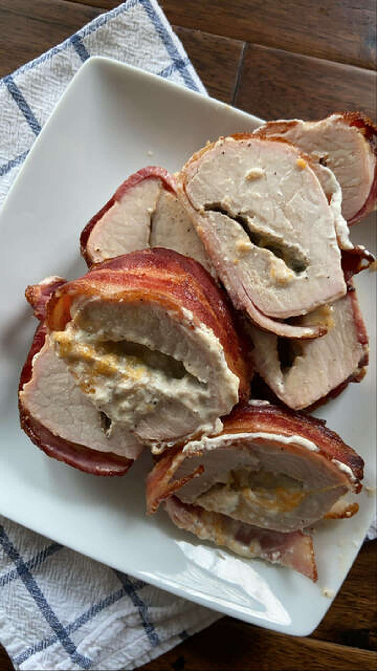 Recipe creator Rachel Tritsch says this Bacon-Wrapped Stuffed Pork Tenderloin dish is one of those dishes she makes every week for her family.
