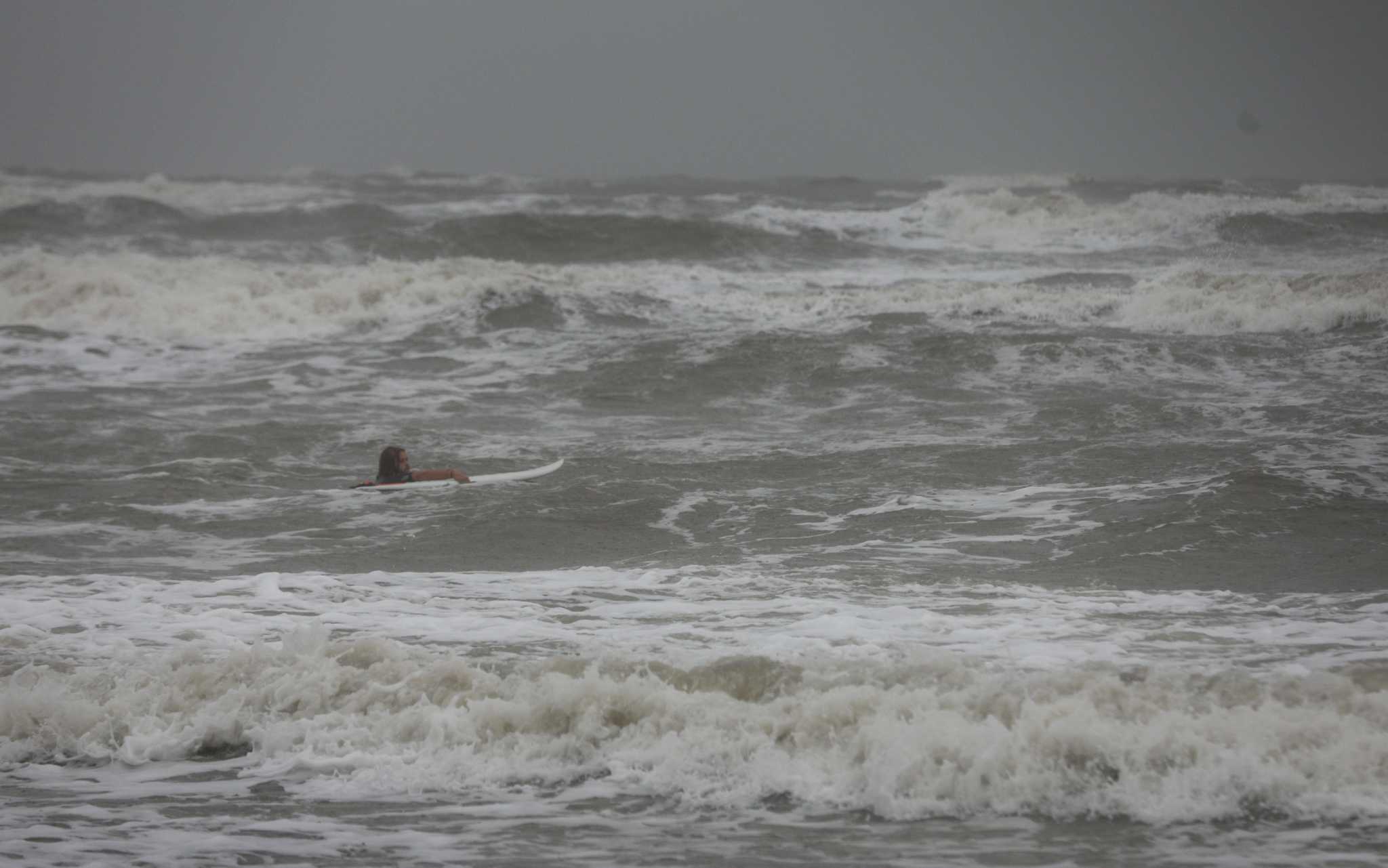 'It could be really fun': Handful surf in Galveston as Tropical Storm ...