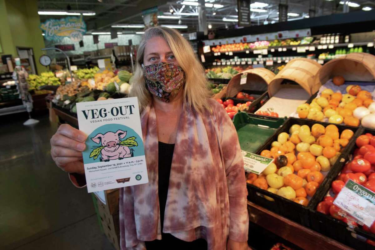 Amy Ellis, community relations specialist at Honest Weight Food Co-Op, stands in the produce section of the store on Tuesday. Honest Weight Food Co-Op is an event sponsor for the upcoming VEG OUT, a vegan food festival scheduled for Sunday, Sept. 19 in Troy.