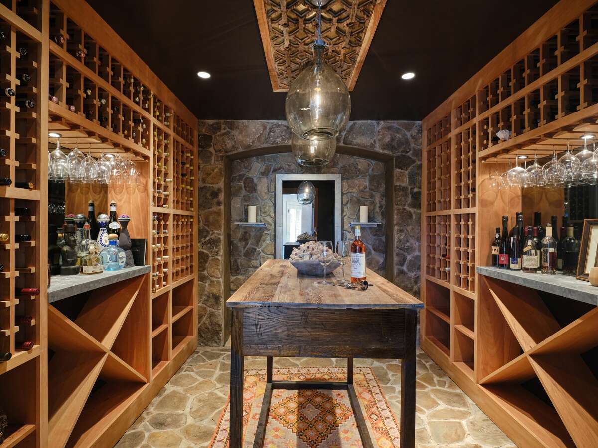 The home on 33 Chestnut Woods Road in Redding, Conn. has a wine grotto and tasting room.