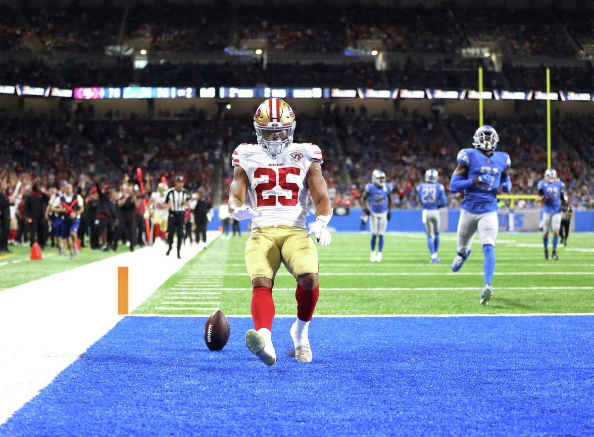 Eli Mitchell of the San Francisco 49ers plays against the Detroit