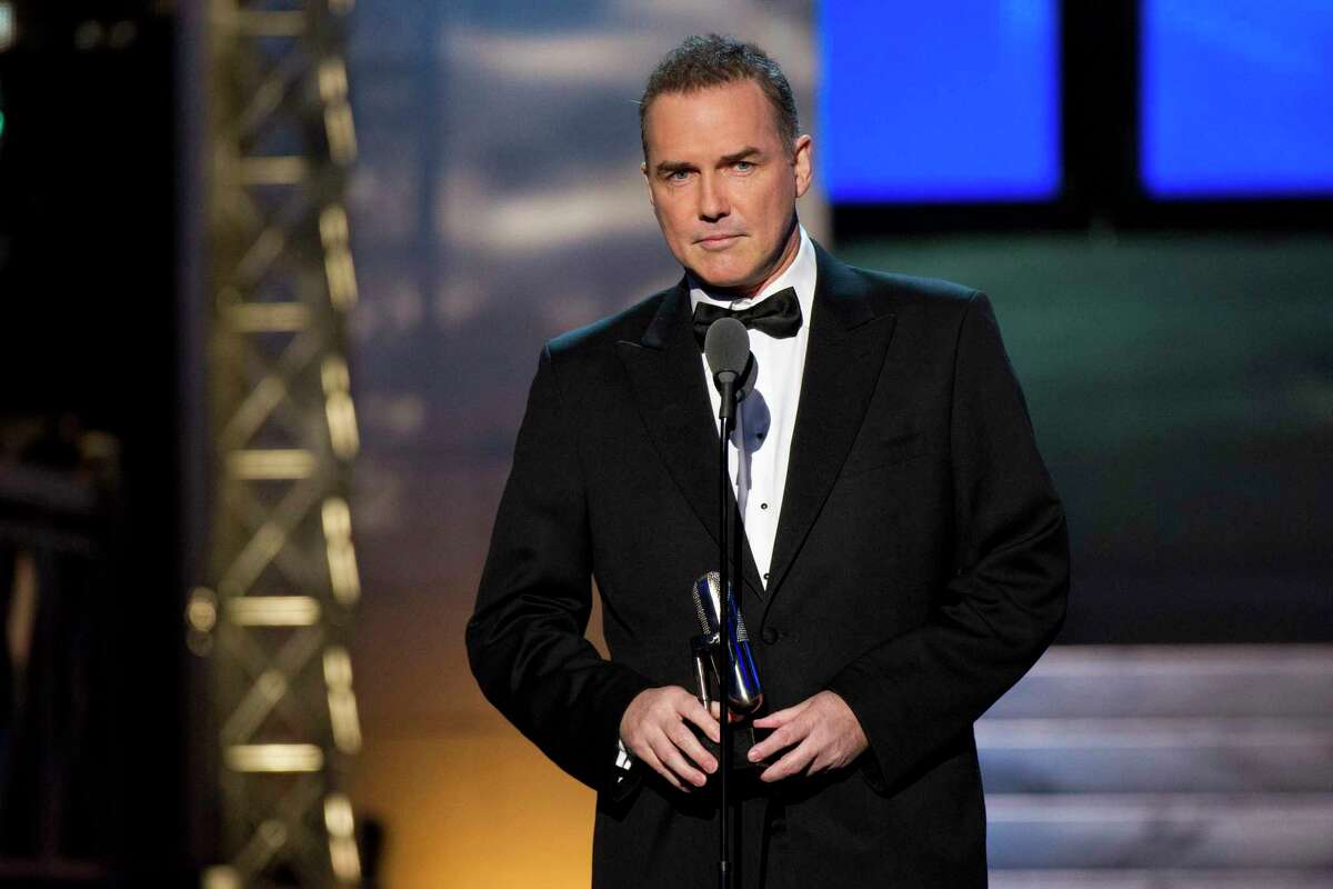 FILE - Comedian-actor Norm Macdonald appears onstage at The 2012 Comedy Awards in New York on April 28, 2012. MacDonald, a comedian and former cast member on "Saturday Night Live," died Tuesday, Sept. 14, 2021, after a nine-year battle with cancer that he kept private, according to Brillstein Entertainment Partners, his management firm in Los Angeles. He was 61.