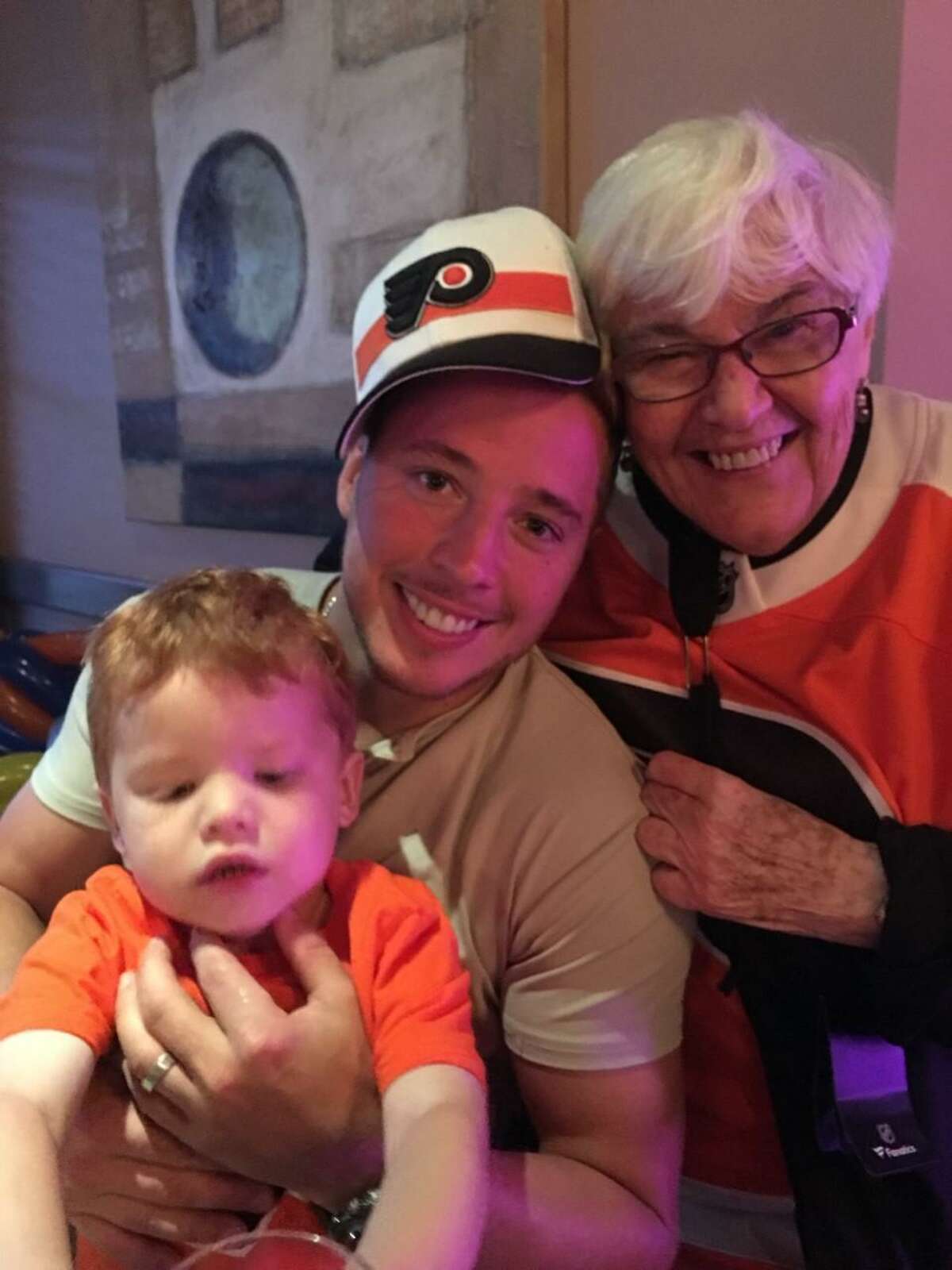 Greenwich native and NHL star Cam Atkinson with his grandmother, Marge Robben.