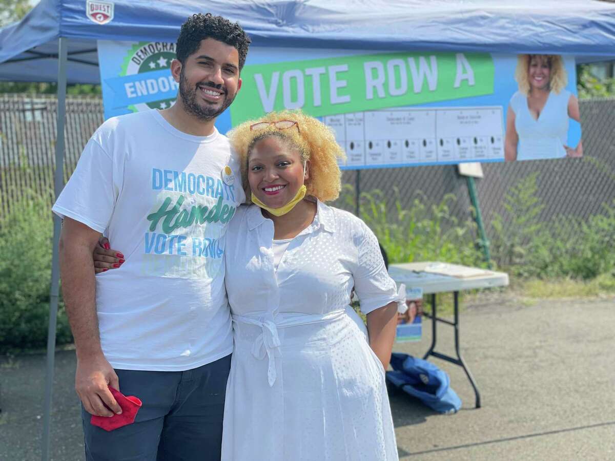 At-large Councilwoman Dominique Baez, right, with her husband Joe Baez outside the Keefe Community Center in Hamden on Sept. 14, the day of a contentious Democratic primary.