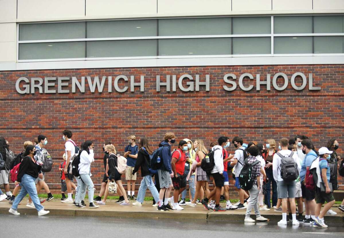 Students are dismissed after the first day of the 2021-2022 school year at Greenwich High School in Greenwich, Conn. Wednesday, Sept. 1, 2021.