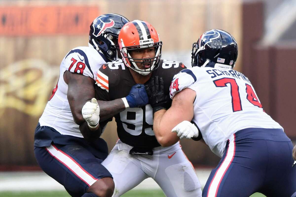 Myles Garrett (95) and Laremy Tunsil (78) have been facing off since their days at Texas A&M and Mississippi, respectively. They'll meet again Sunday in Cleveland for the second time in their NFL careers.