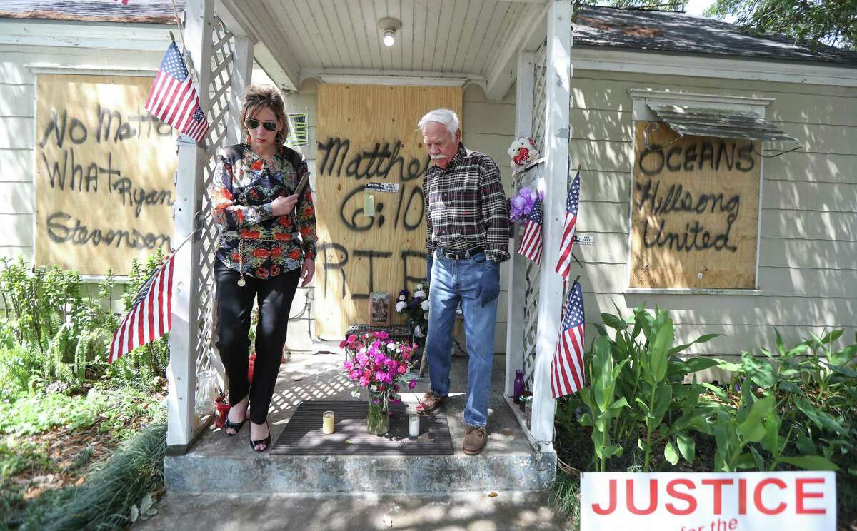Shawna Fugate (left) aids Cliff Tuttle, uncle of shooting victim Dennis Tuttle, as they prepare to enter 7815 Harding for the first time since the raid Tuesday, April 16, 2019, in Houston.