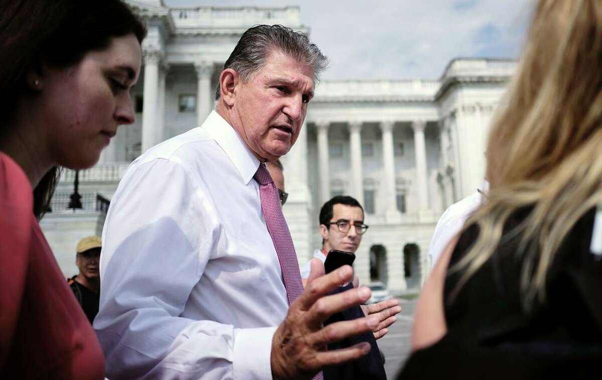 Sen. Joe Manchin (D-W.Va.) speaks to reporters outside the U.S. Capitol on July 30, 2021. Manchin was the lone Democrat to oppose a broader voting rights bill.