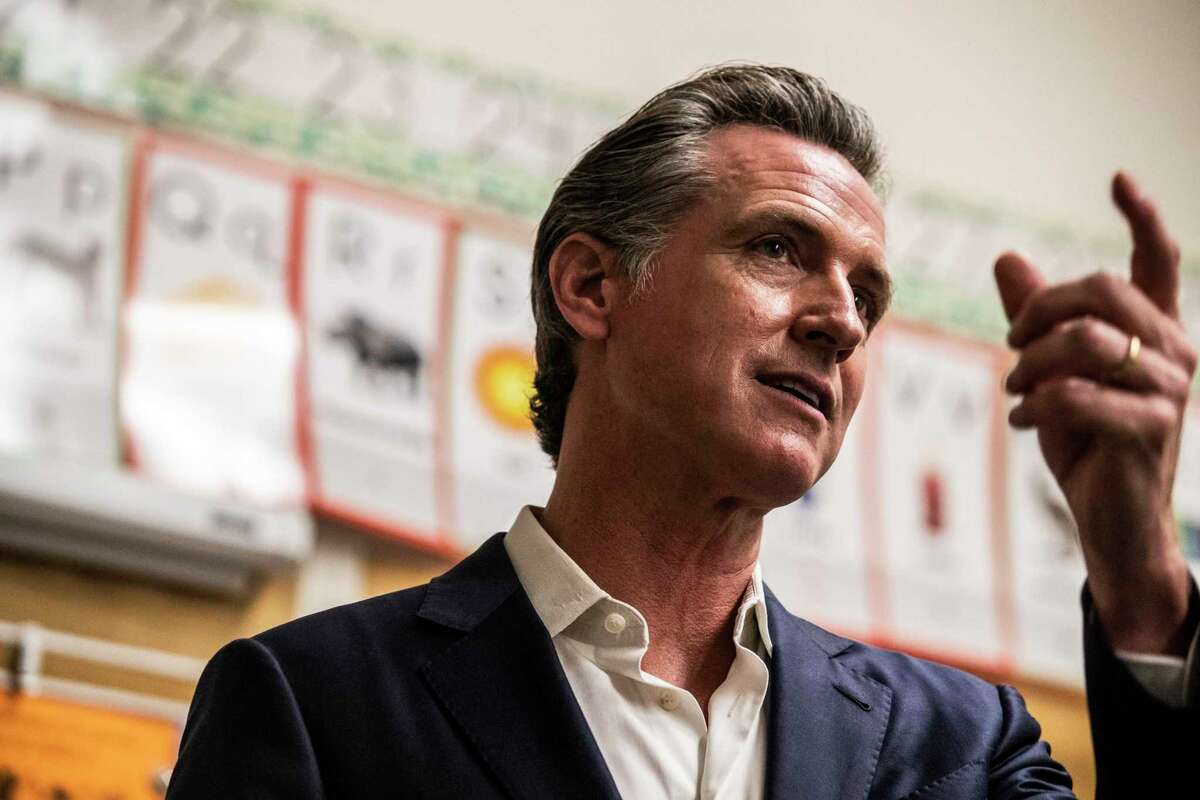 California Governor Gavin Newsom speaks to members of the media after meeting students at Melrose Leadership Academy during a school visit in Oakland, California Wednesday, Sept. 15, 2021.