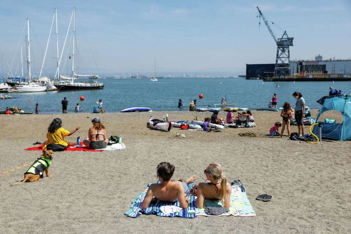 Beachgoers enjoy Crane Cove Park in San Francisco on Sept. 6. Air quality in the Bay Area has been better so far this fire season than last.