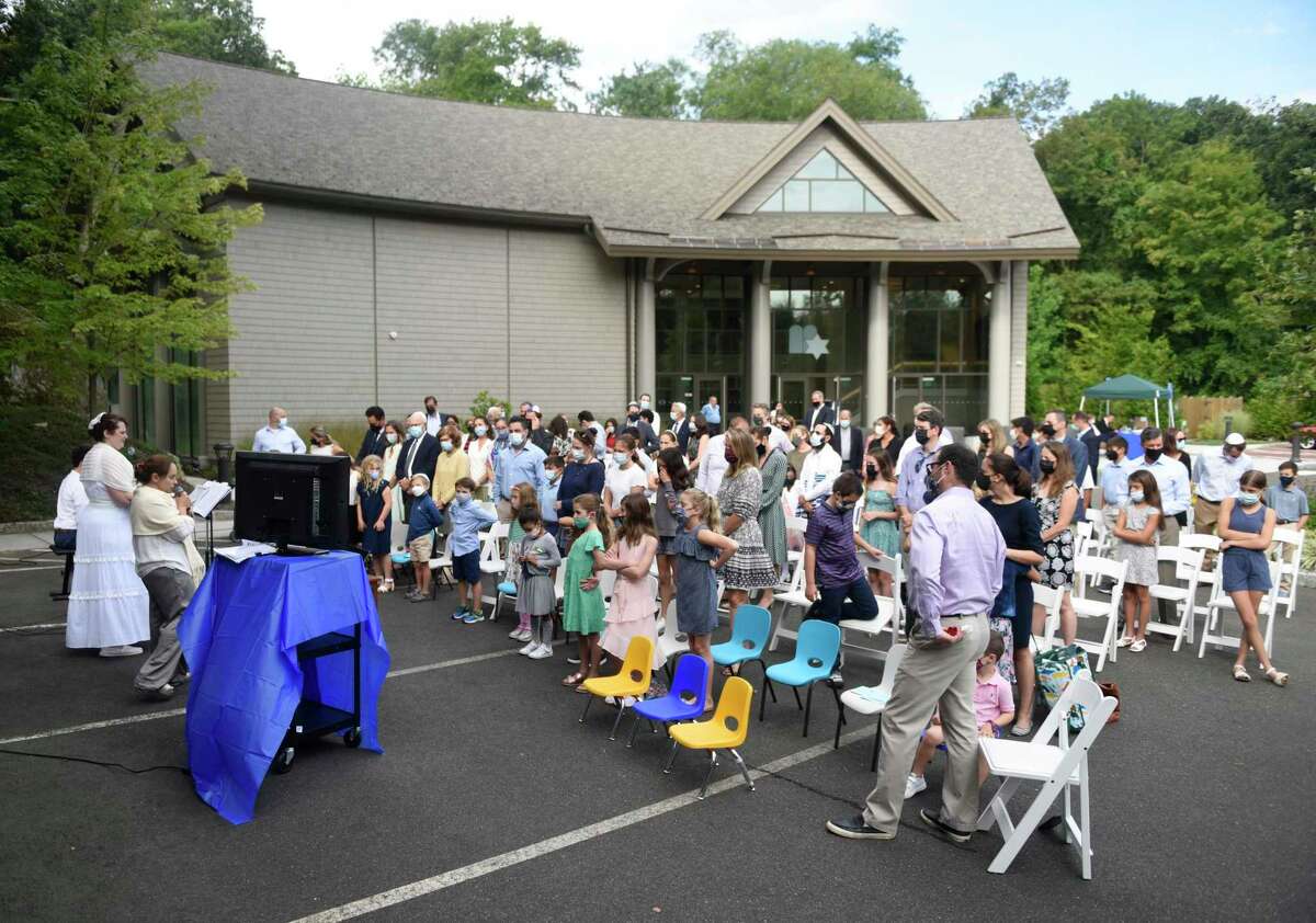 The Yom Kippur Family Service takes place outside the Reformed Greenwich Synagogue in Greenwich, Connecticut on Thursday, September 16, 2021. Worshipers celebrated Yom Kippur, the day of Jewish Atonement, with a variety of readings and songs .