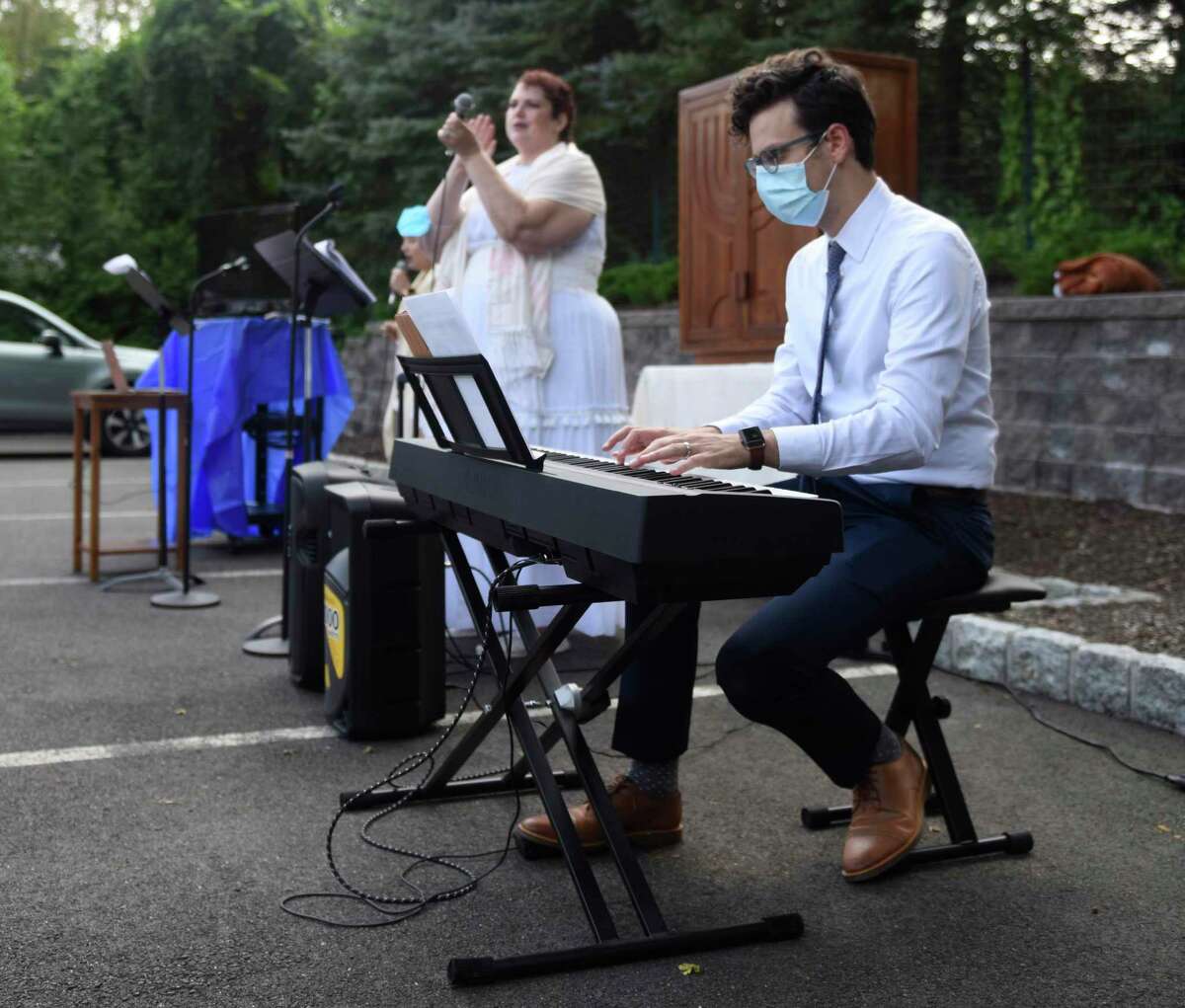 Music is performed during the Yom Kippur Family Service at the Greenwich Reform Synagogue in Greenwich, Connecticut on Thursday, September 16, 2021. Worshipers celebrated Yom Kippur, the Jewish Day of Atonement, with a variety of readings and songs.