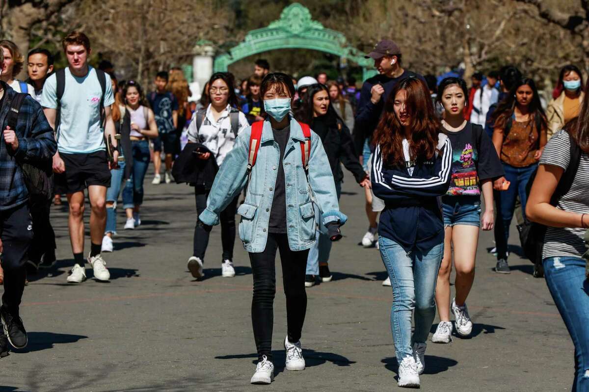 People stroll on the UC Berkeley campus. State lawmakers rushed to free it and other state colleges and universities from the portion of an environmental law that led UC Berkeley to set an enrollment cap
