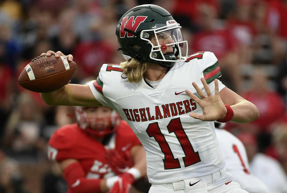The Woodlands quarterback Mabrey Mettauer throws a pass during the first half of a high school football game against Katy, Thursday, Sept. 16, 2021, in Katy.