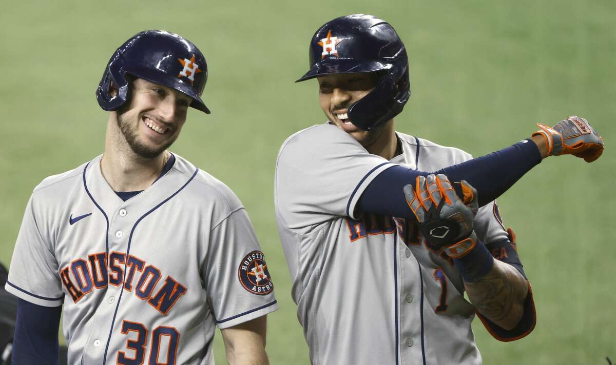 Houston Astros first baseman Yuli Gurriel walks off the field at the end of  an inning during a baseball game against the Texas Rangers in Arlington,  Texas, Sunday, May 23, 2021. (AP