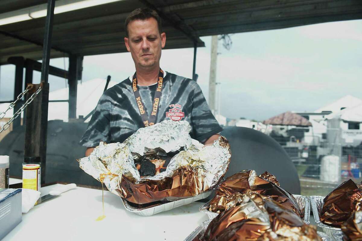 Jeff Ottosen of N-Flames shows off some brisket.