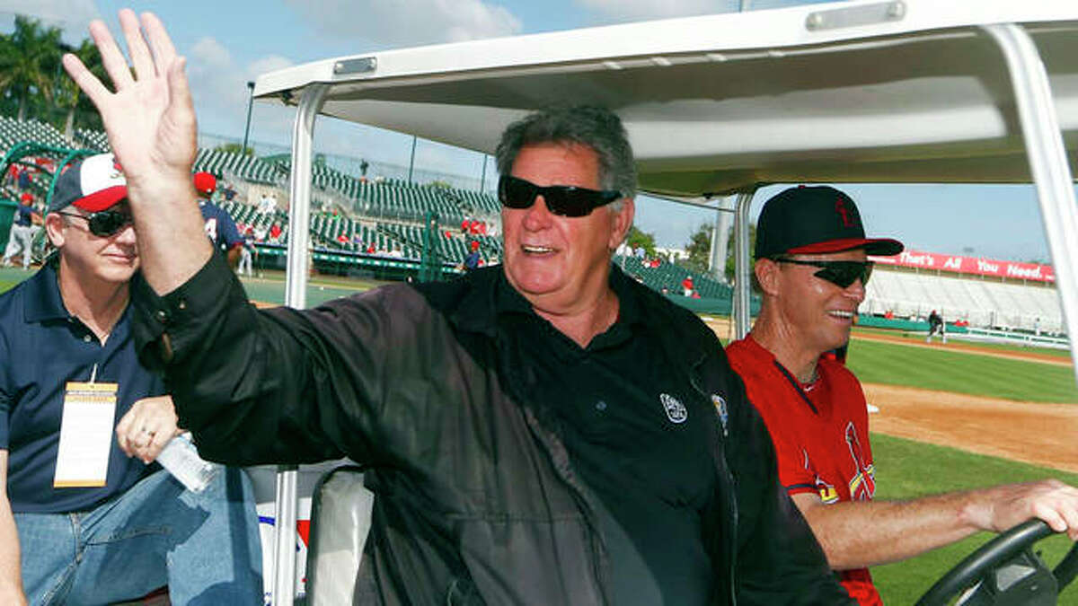 Longtime Cardinals announcer and former player Mike Shannon waves to fans at spring raining in Jupiter, Fla. Shannon, who is retiring, will be honored by the Cardinals at their final home game of the season Oct. 3 against the Cubs.