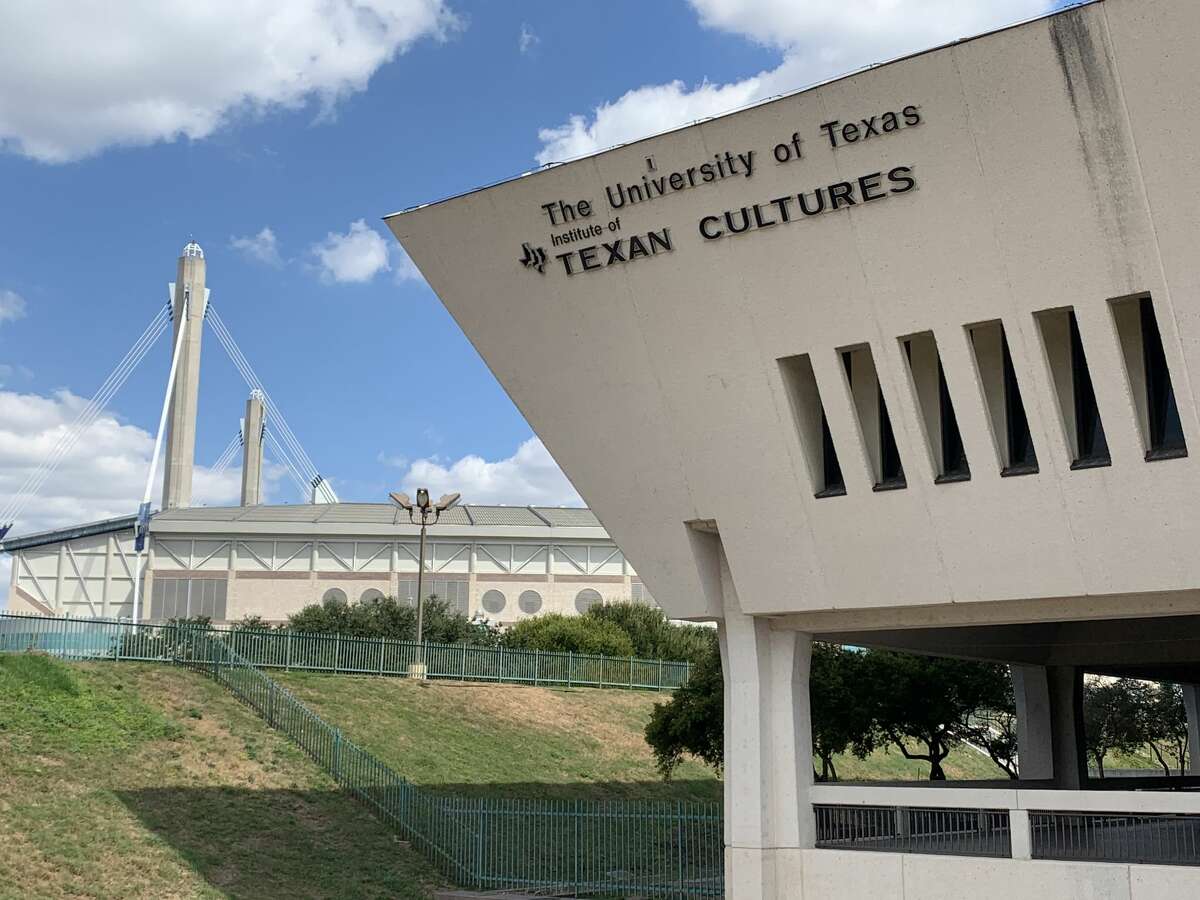 The entrance to the Institute of Texan Cultures, backdropped by the Alamodome.