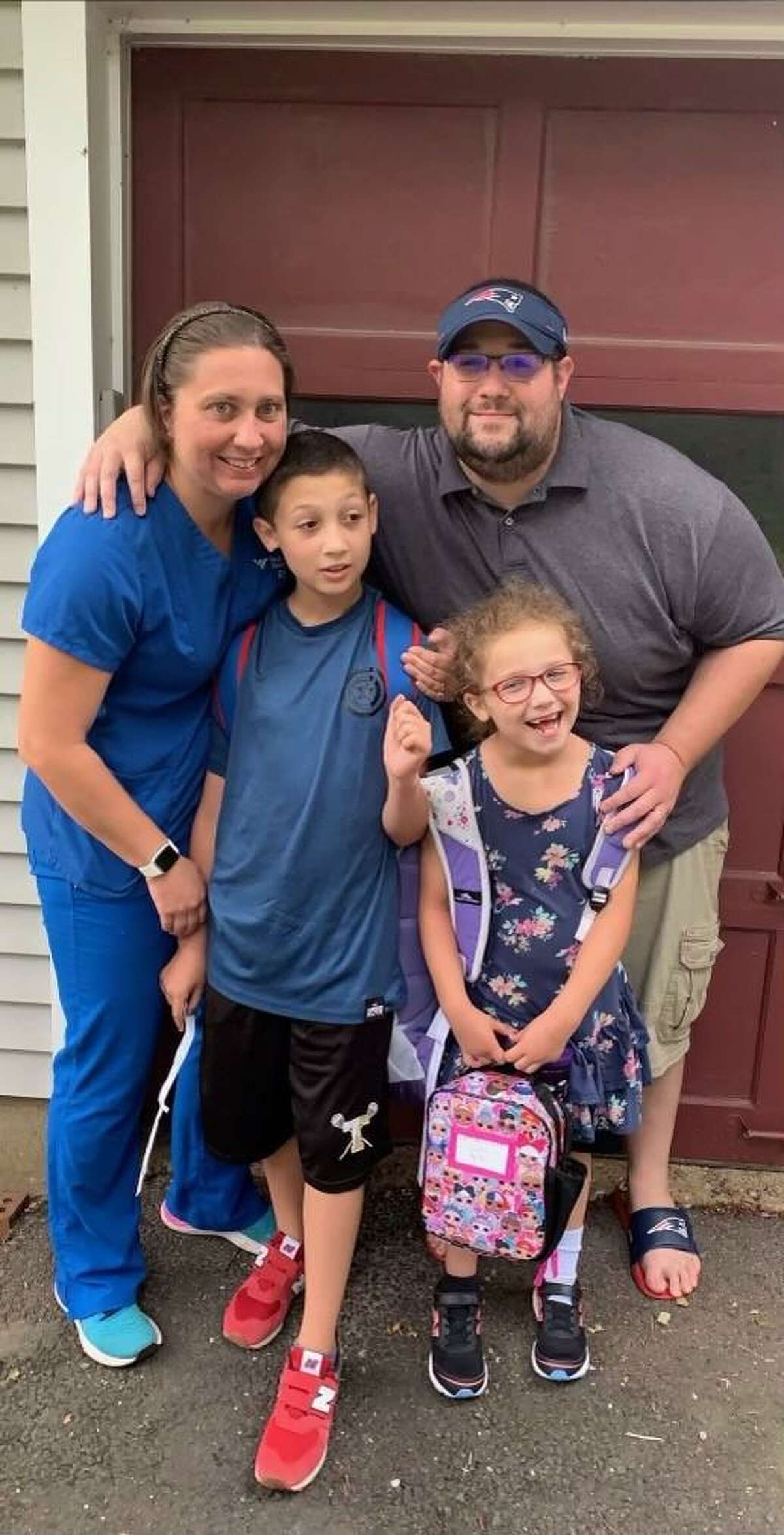 Ashley Balestriere, with husband Philip, hopes a vaccine trial can help her children Jimmy, 10, and Amy Ruth, 7, have a normal childhood.