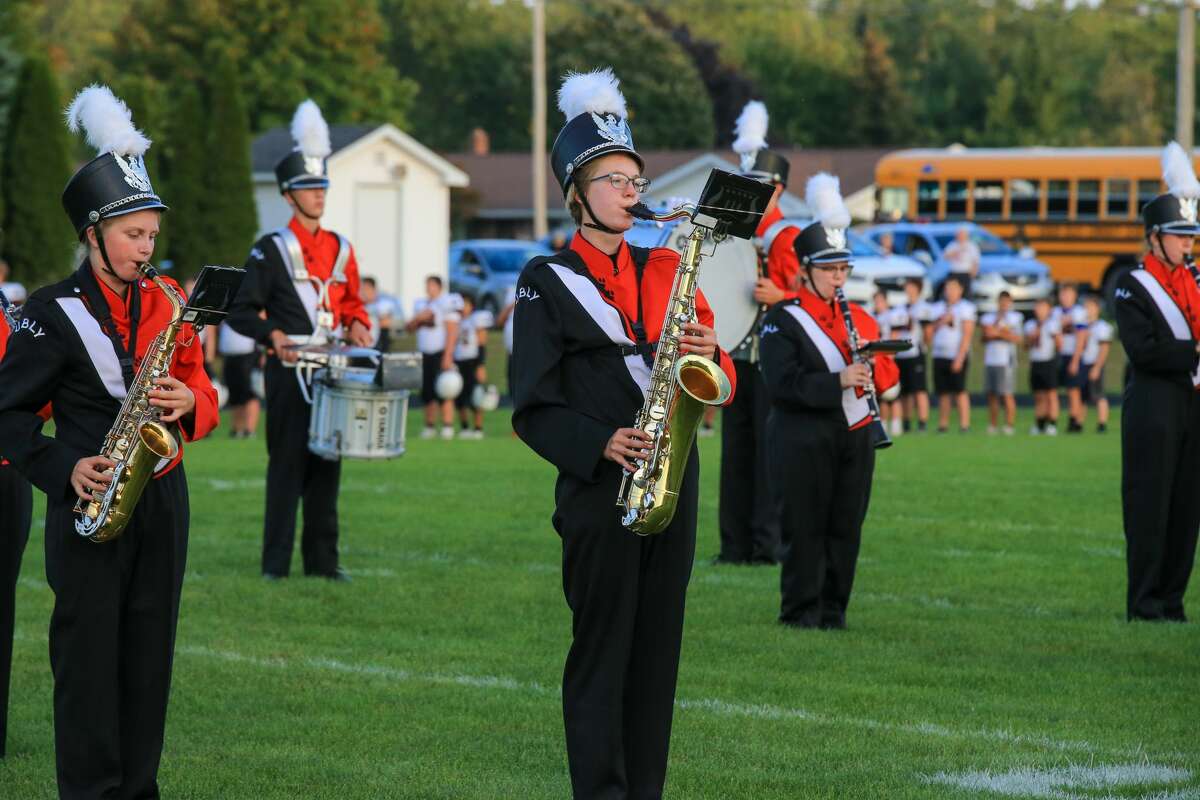 The band performs the national anthem before the Ubly and Harbor Beach football game in Ubly Friday night.