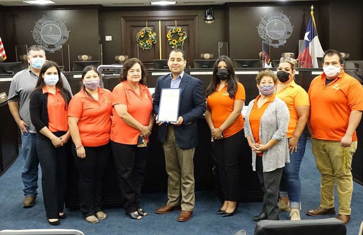 City of Laredo District IV Councilmember Alberto Torres Jr. is pictured on Thursday with South Texas Food Bank representatives to proclaim September as Hunger Action Month.