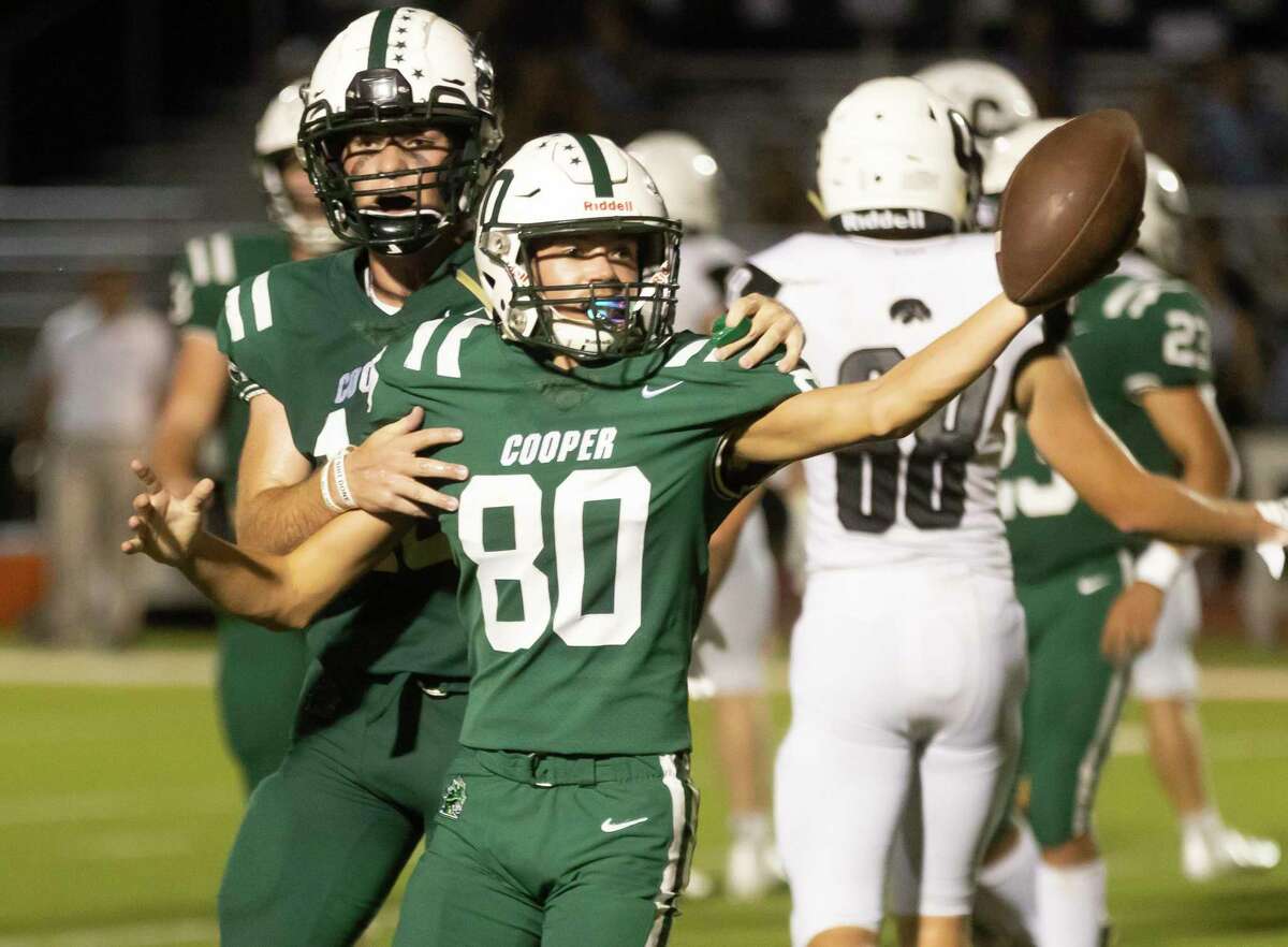 Jon Cooper Ronnie Woodall (80) celebrates after he intercepts a pass from Cistercian during the second quarter of a Southwest Prep 3A football game at The Woodlands Christian Academy, Friday, Sept. 17, 2021, in The Woodlands.