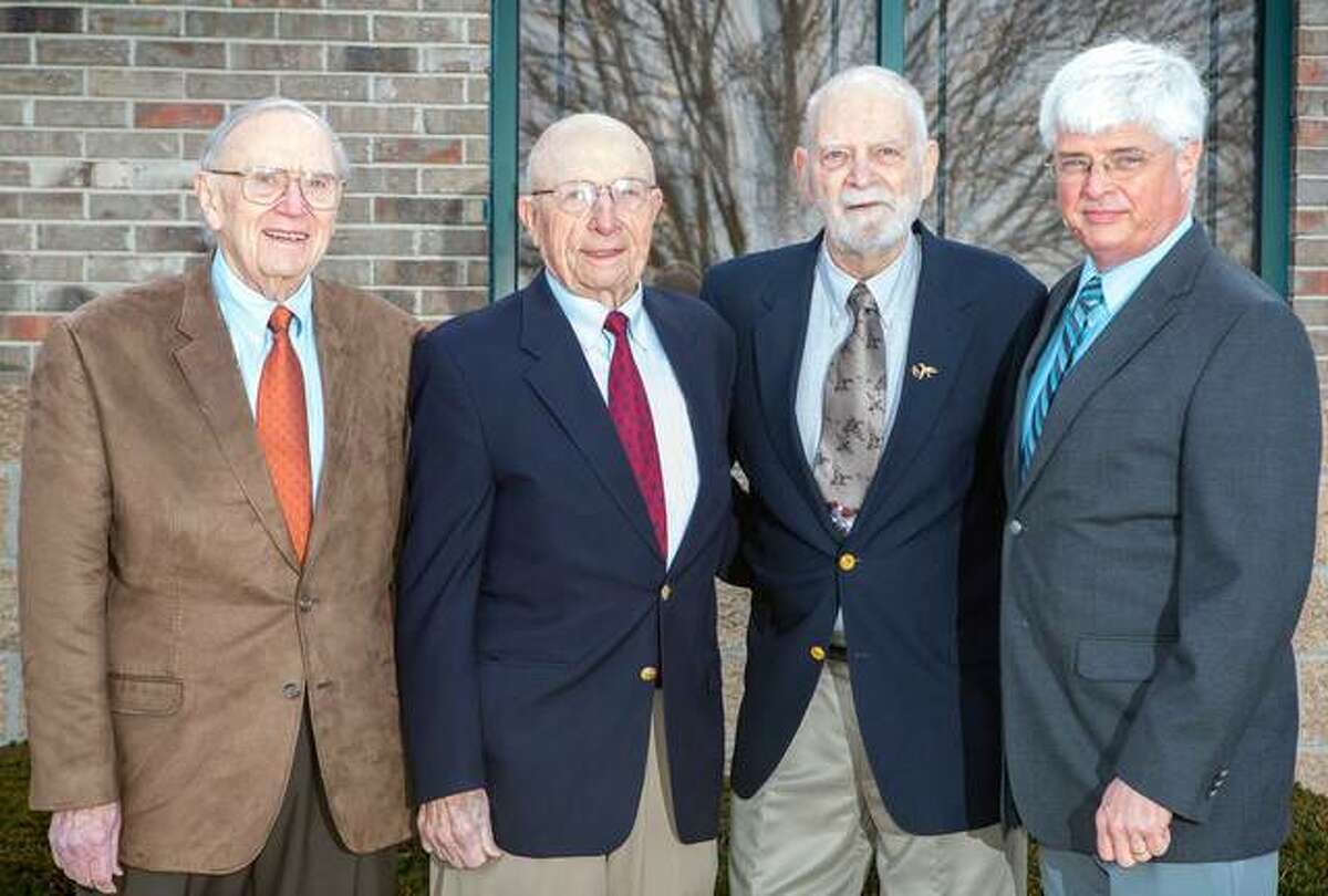 Hawthorne Animal Hospital in Glen Carbon will celebrate its 65th year on Sunday, Sept. 26. Pictured are Dr. Merrill Ottwein, Dr. Joe Helms, Dr. Art Lippoldt and current owner Dr. Paul Myer.