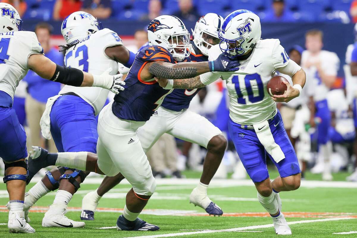 UTSA's Trumane Bell II sacks Middle Tennessee quarterback Bailey Hockman during the first half of their opening Conference USA football game at the Alamodome on Saturday, Sept. 18, 2021.