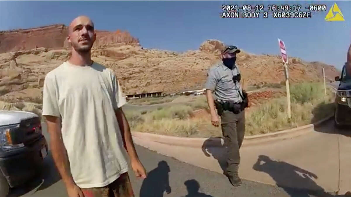 This police camera video provided by the Moab Police Department shows Brian Laundrie talking to a police officer after police stop the van he was traveling in with his girlfriend Gabrielle "Jacasseur" Petito, near the entrance to Arches National Park, August 12, 2021. 