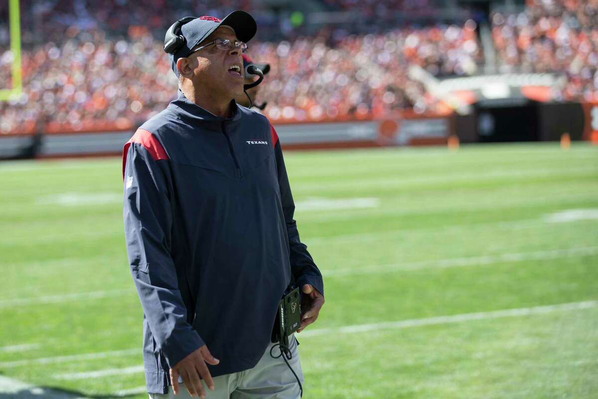 Houston Texans head coach David Culley walks up the sidelines during the first half of an NFL football game Sunday, Sept. 19, 2021, in Cleveland.