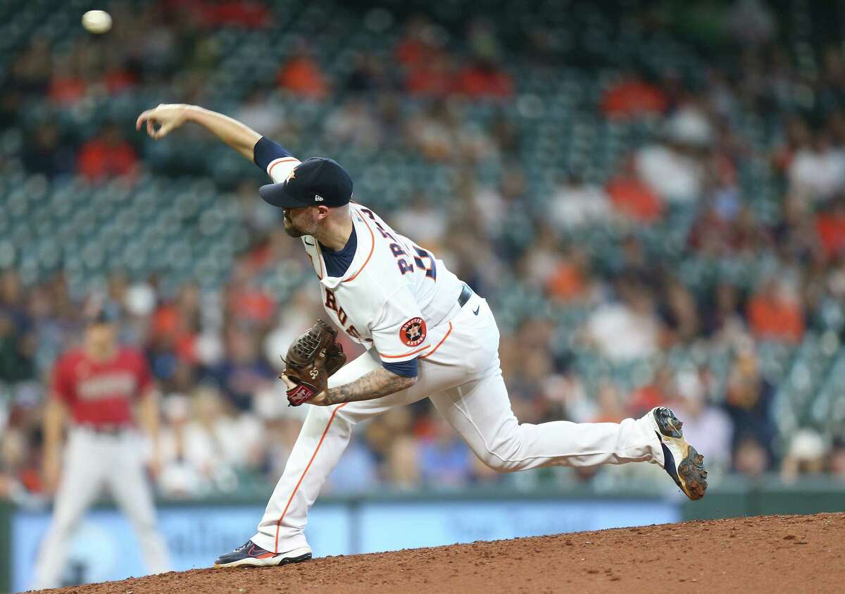 Houston Astros relief pitcher Ryan Pressly kicks the mound after