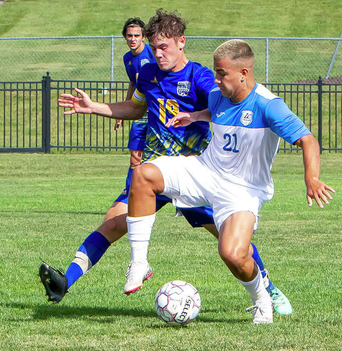 Lewis and Clark Community College’s Dudu Rodrigues (21) battles for the ball with Logan Cupi of Illinois Central College Sunday at LCCC’s Tim Rooney Stadium.