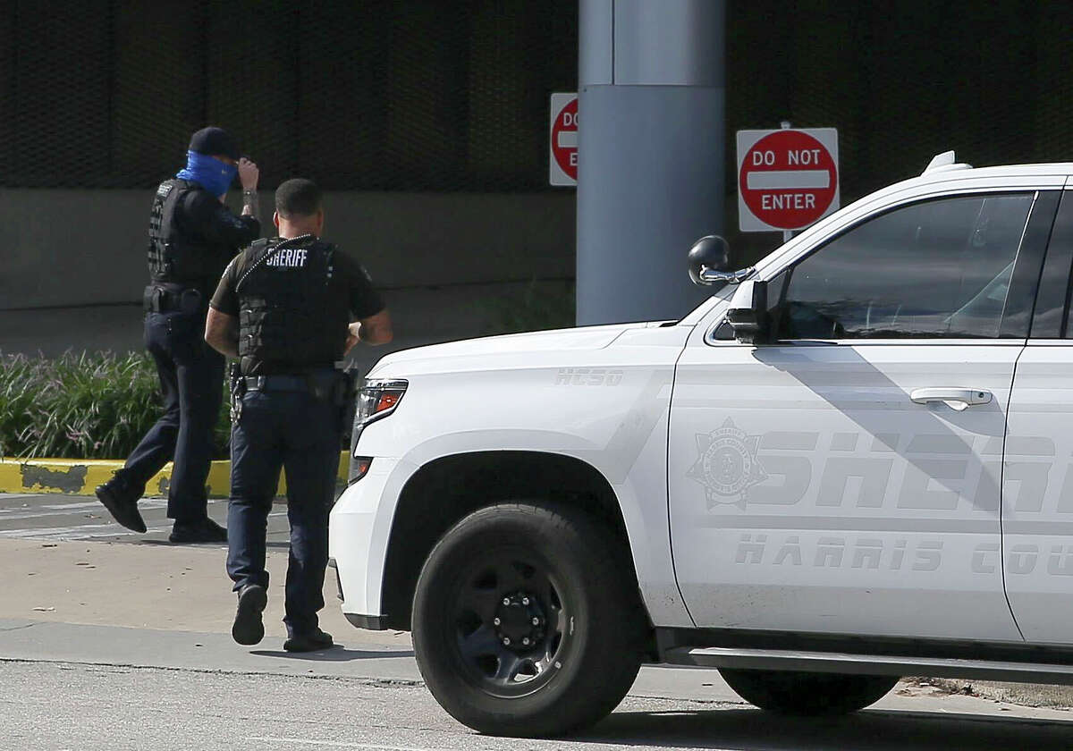 Delegate delegates arrive outside Memorial Hermann ER.  Two officers were shot after police issued an arrest warrant at a Harris County complex on Monday, September 20, 2021.