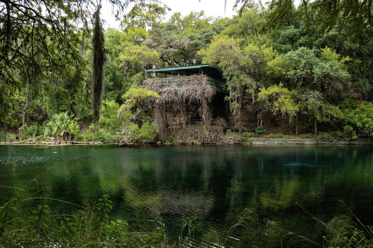 An abandoned structure sits Wednesday at site of the defunct Aquarena Springs Amusement Park at Spring Lake in San Marcos. The area is now Texas State's Meadows Center for Water and the Environment.