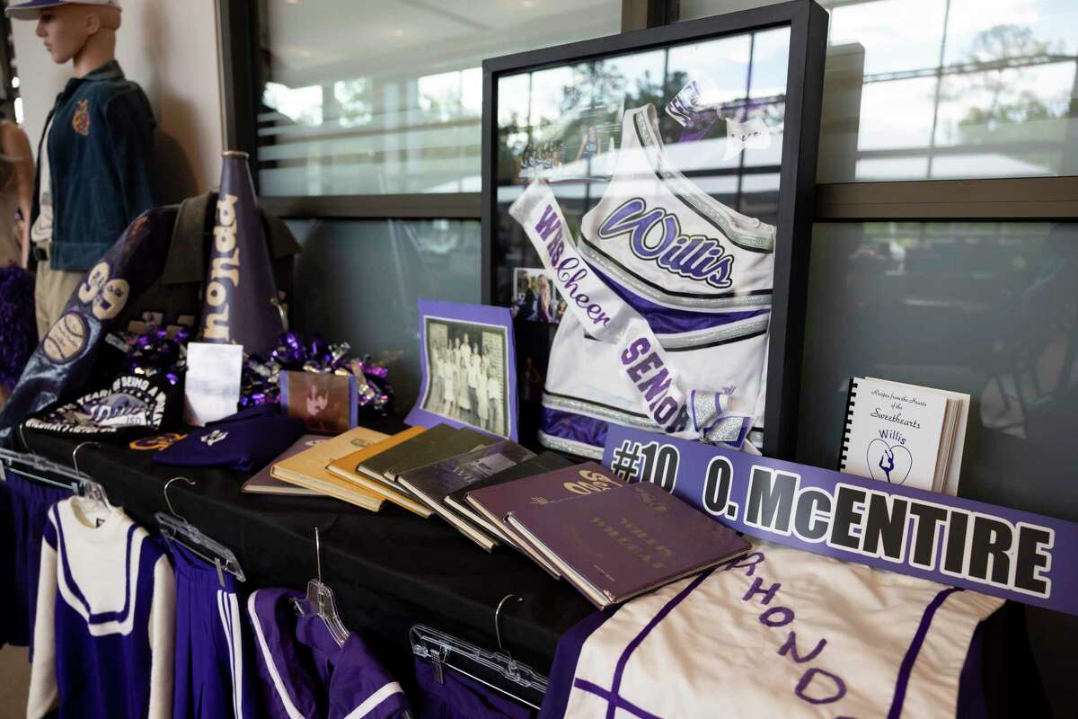 A table with items throughout Willis ISD's years since opening is seen during a celebration of Willis ISD's 115th Birthday hosted by the Willis ISD Education Foundation, Saturday, Sept. 18, 2021, in Willis.