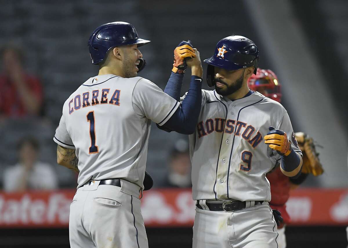 ANAHEIM, CA - SEPTEMBER 20: Houston Astros right fielder Jose Siri (26)  celebrates his lead off home run during the MLB game between the Houston  Astros and the Los Angeles Angels of