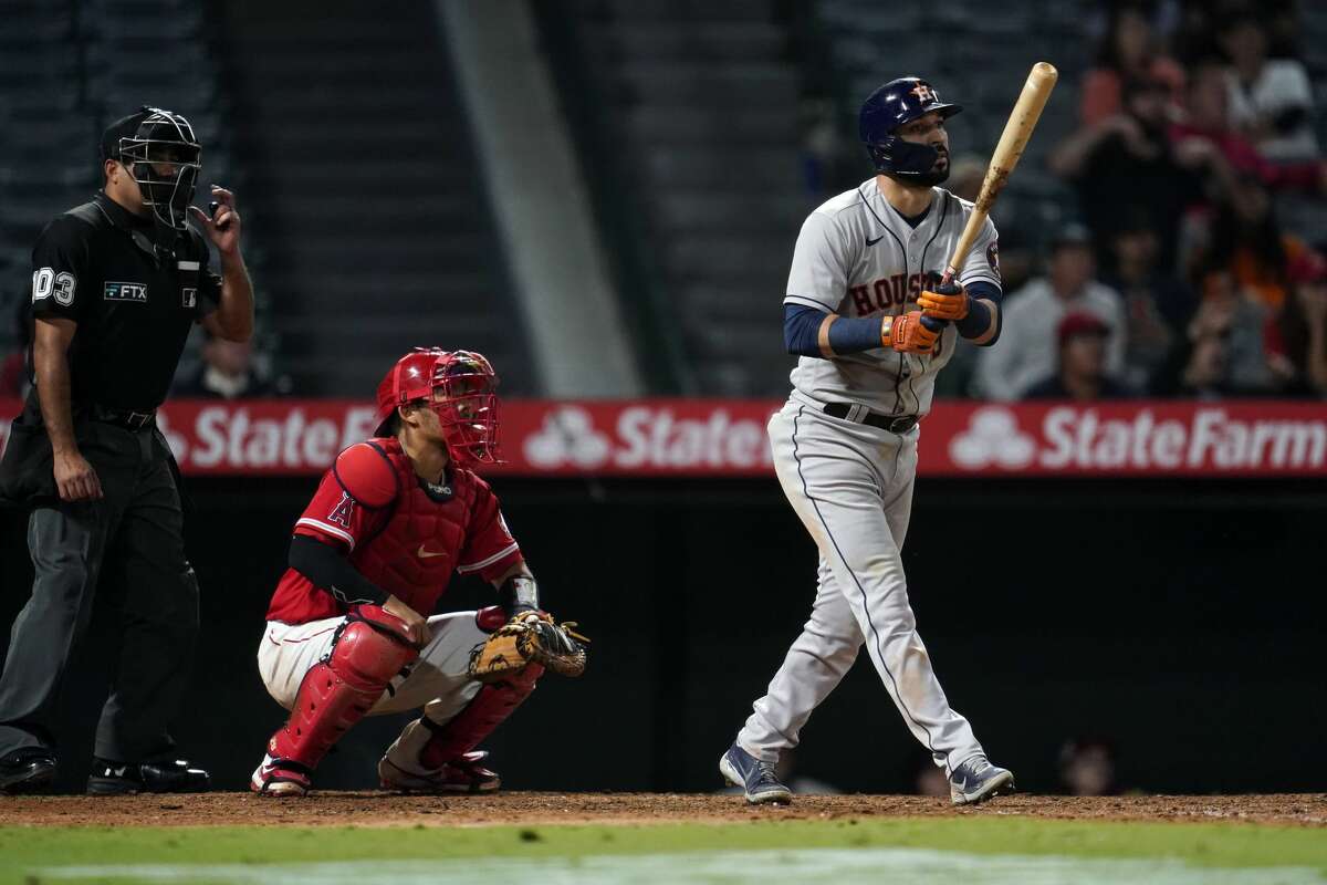 ANAHEIM, CA - SEPTEMBER 20: Houston Astros right fielder Jose Siri (26)  celebrates his lead off home run during the MLB game between the Houston  Astros and the Los Angeles Angels of