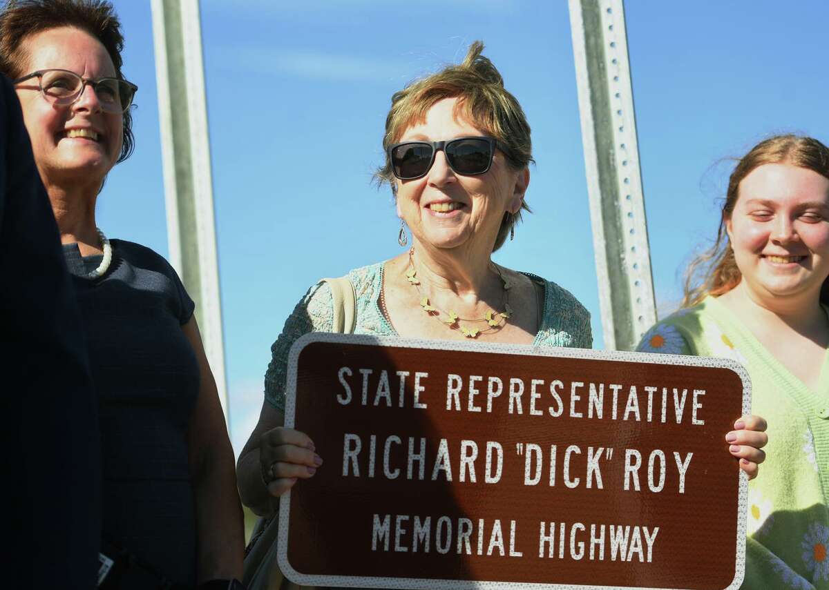 Pat Roy, center, attends the ceremony honoring her late husband, former State Rep. Richard "Dick" Roy, naming a bridge across the Oyster River in his name in Milford, Conn. on Monday, September 20, 2021. At left is Milford State Rep. Kathy Kennedy.