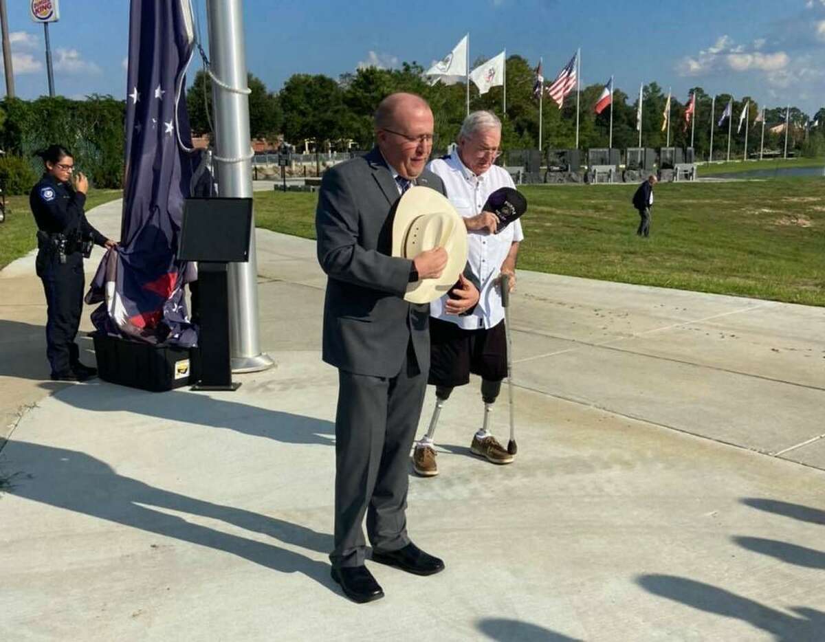 In recognition of the two Houston Police officers shot Monday morning there was a brief ceremony at the First Responders Flag at the Montgomery County Veterans Memorial Park Monday afternoon.