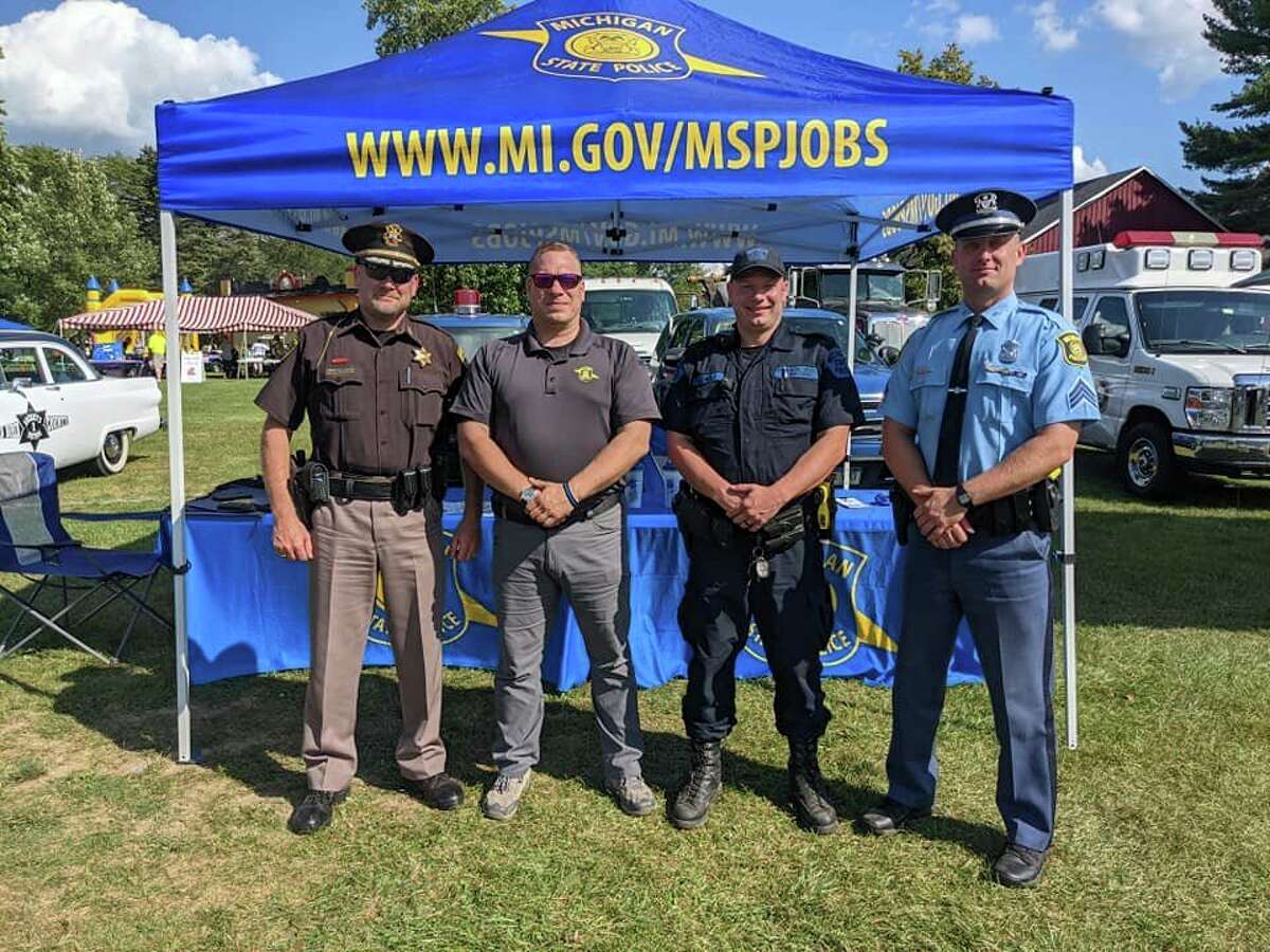 Lake County Sheriff Rich Martin, pictured far left, joined many other police officers and public safety personnel for a fundraiser in support of the Great Lakes Burn Camp. (Courtesy photo)