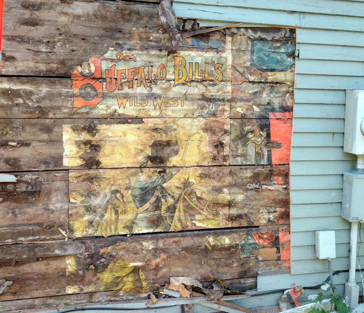 This poster for Buffalo Bill's Wild West and Congress of Rough Riders of the World Show was discovered last week in Manistee as workers removed siding off a building in the Oak Hill area in Filer Township. (Courtesy photo) 