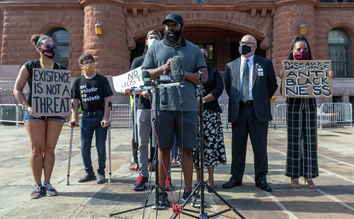 Mathias Ometu, the jogger who was stopped by San Antonio police and wrestled into a police vehicle despite not being the man they were looking for, speaks to the media outside the Bexar County Courthouse on Sept. 2, 2020.