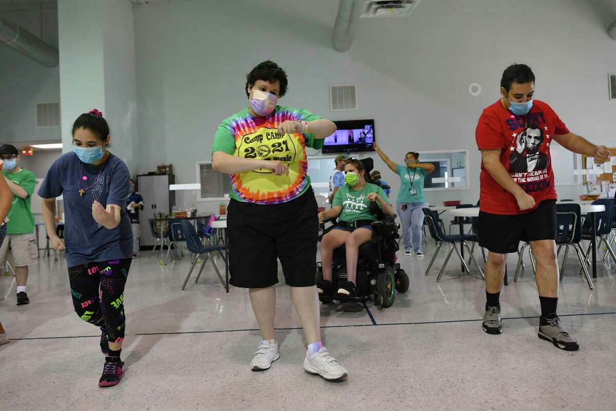 Participants of The Arc of San Antonio’s Adult Life Enrichment program dance during a SPIRIT Club Online fitness event Tuesday. The event coincided with the Big Give, a 24-hour online fundrasier for South Central Texas nonprofits. The Arc of San Antonio supports and protects the human rights of people with intellectual and developmental disabilities.