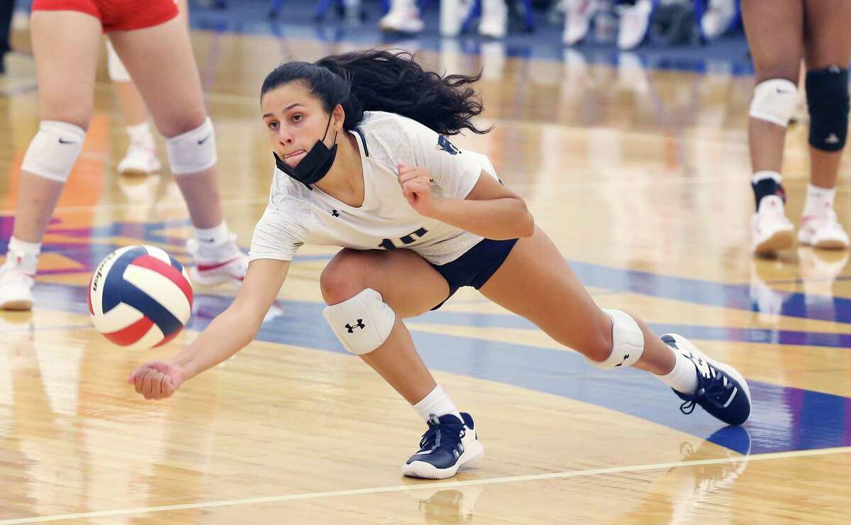 O’Connor’s Jenna Garza (10) makes a save against Taft in girls volleyball at Harlan Gym on Tuesday, Sept. 21, 2021. O’Connor swept Taft, 3-0 in sets, to earn the win.