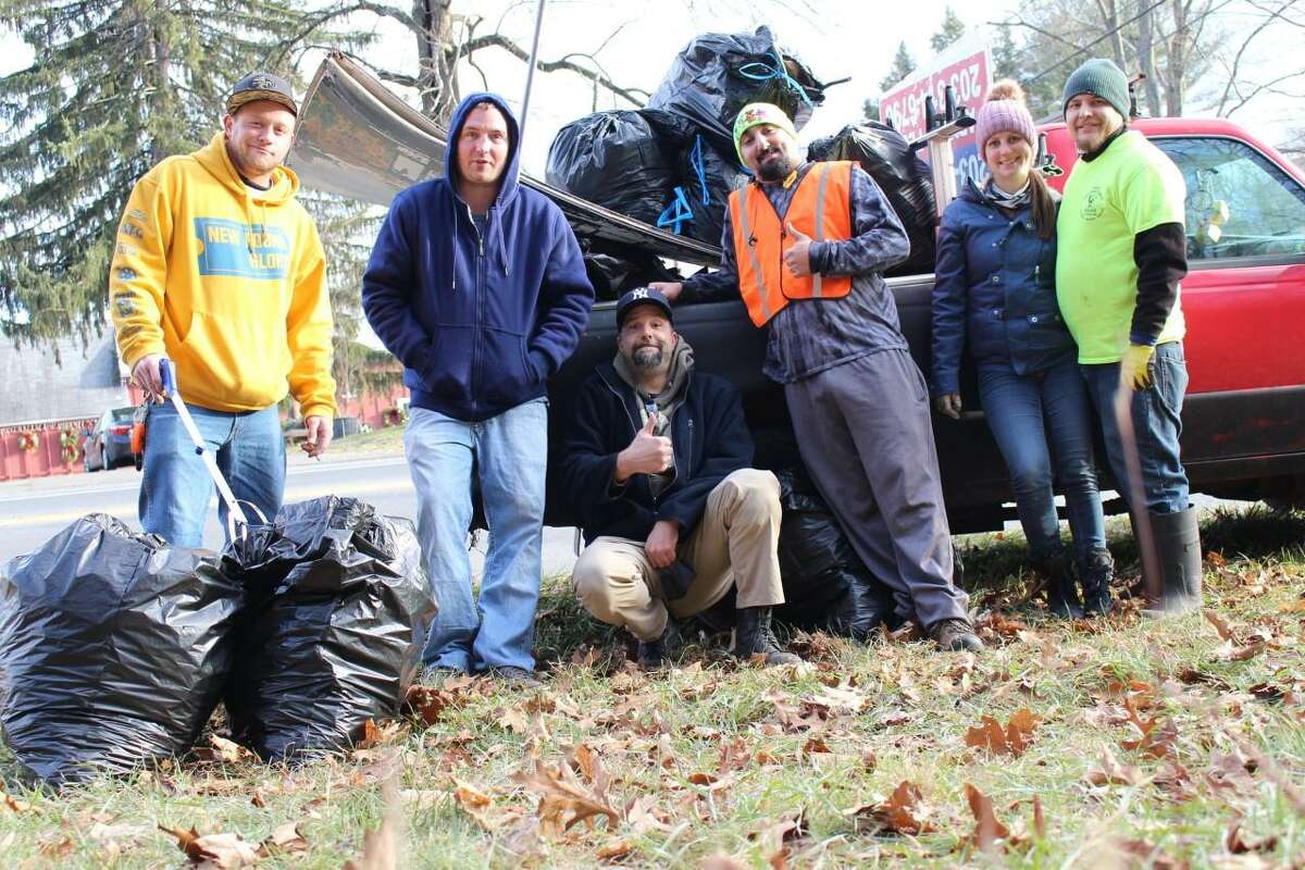 Volunteers with the Shelton Clean-Up Project after a work session along Bridgeport Avenue.